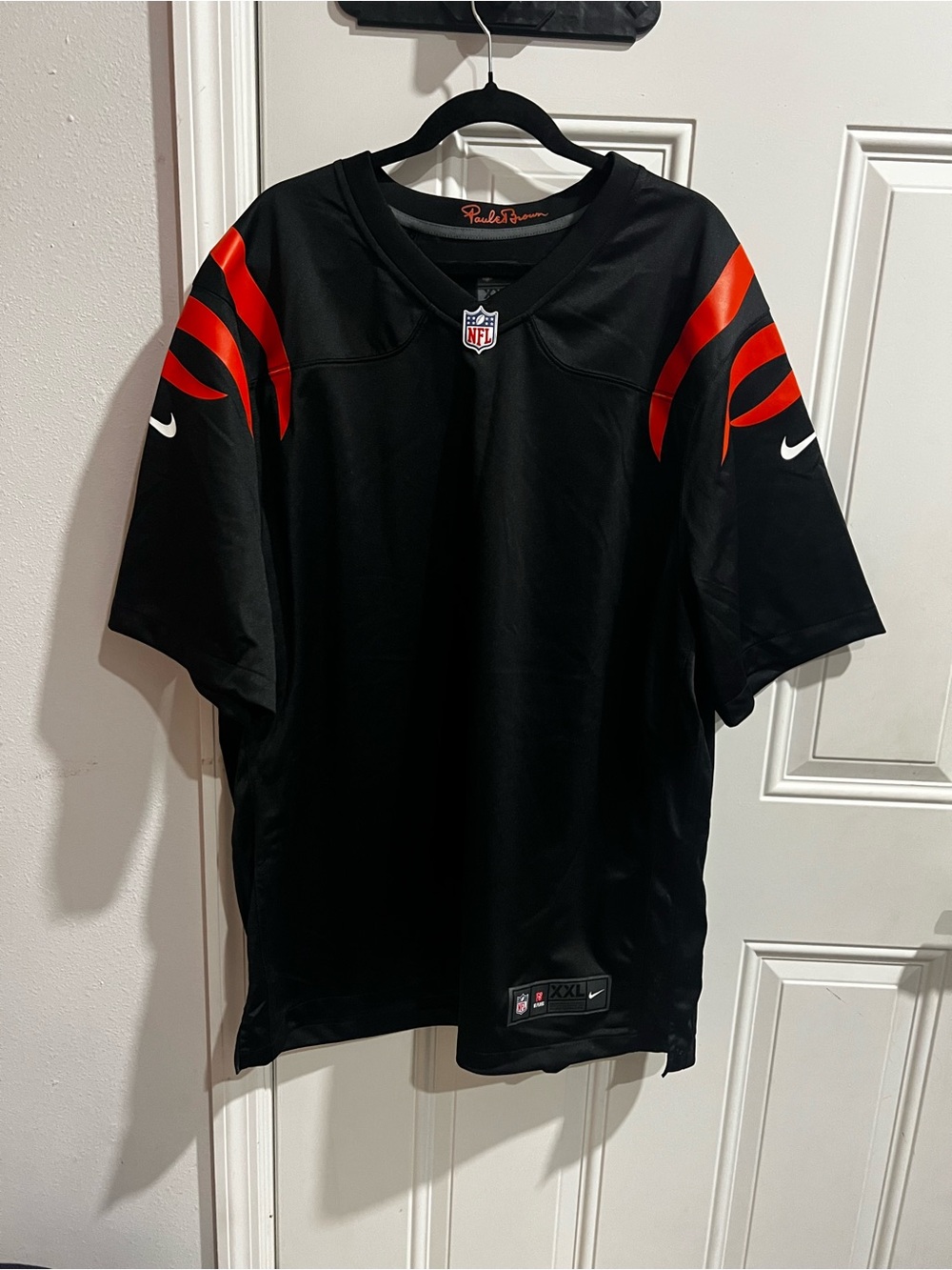 Nike Men’s Black Jersey with Orange Shoulder Stripes